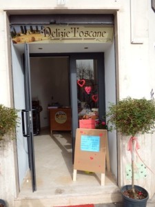 Immagina A) ingresso Delizie Toscane