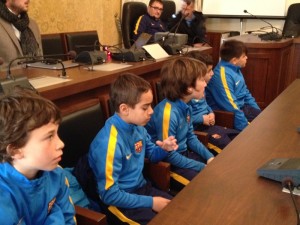Foto a) Piccoli rugbysti in comune